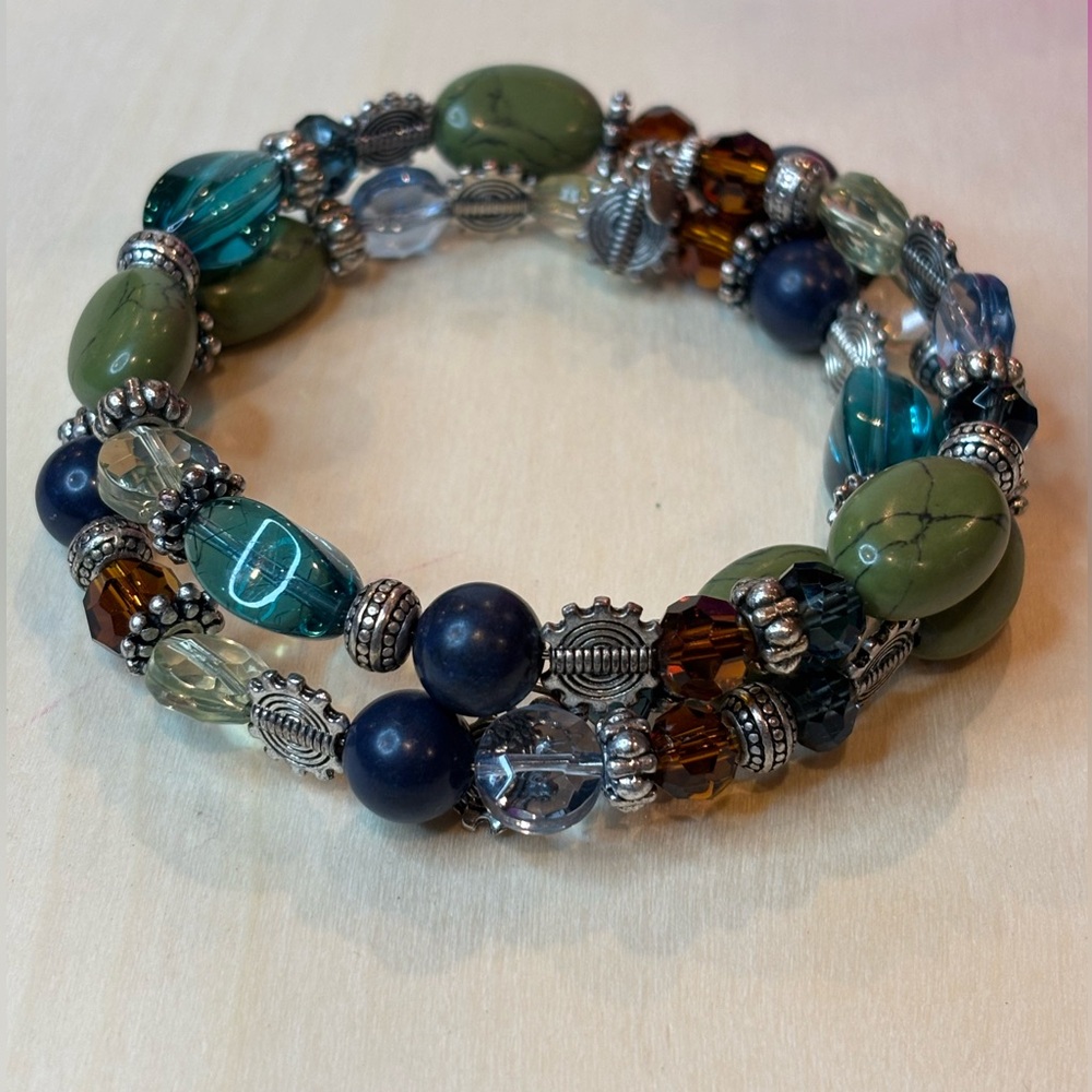 Premier Designs wrap bracelet. Silver toned with green, blue, and silver tones.